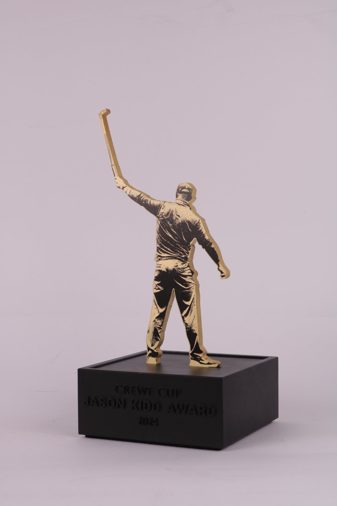black base for a custom trophy with a 3d printed golfer with messing