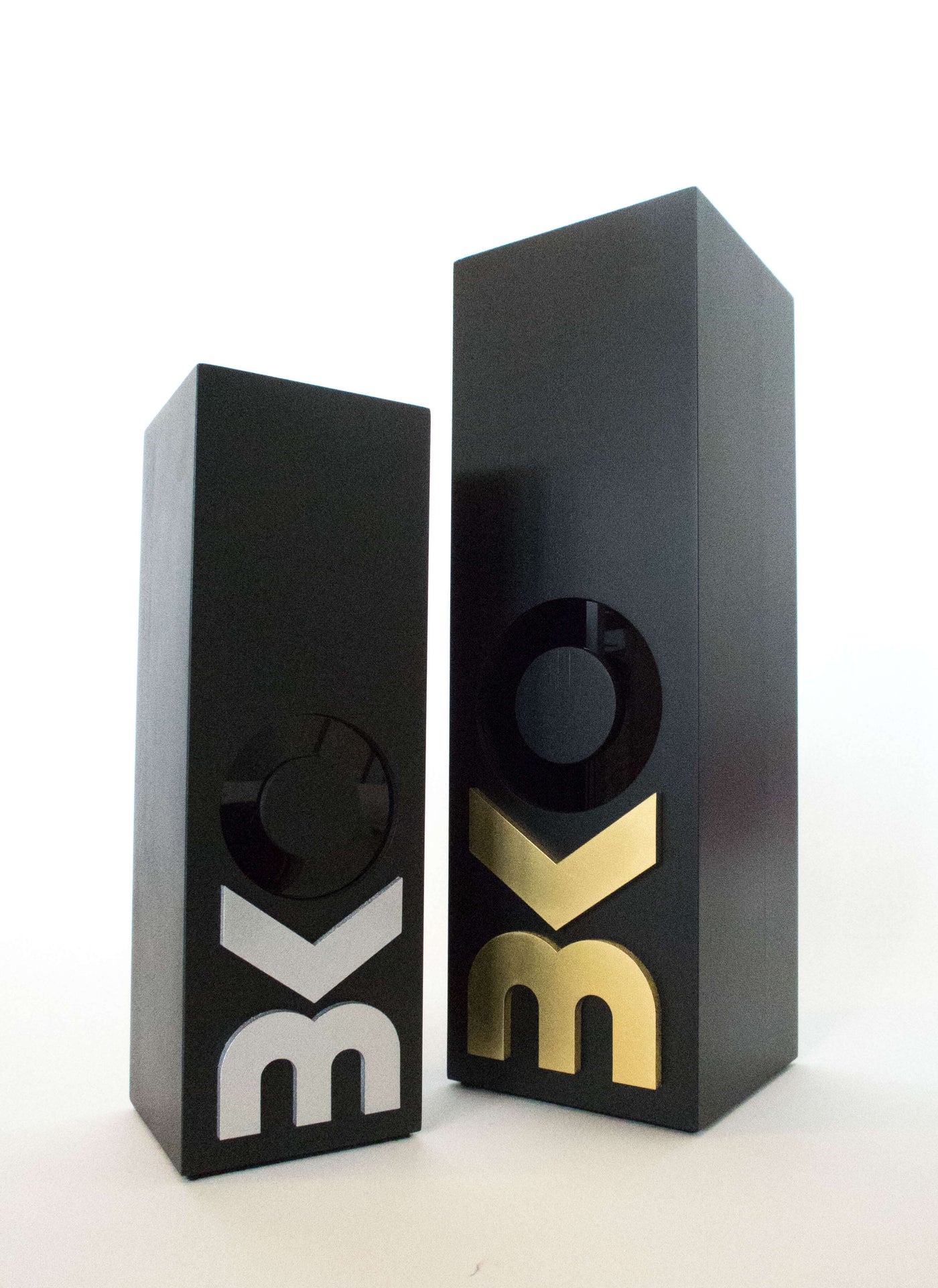 black trophies with white and gold letters for a custom golf trophy