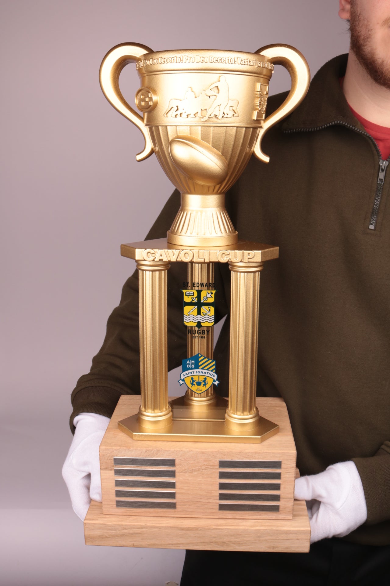 oak base with a 3d printed brassed trophy on top