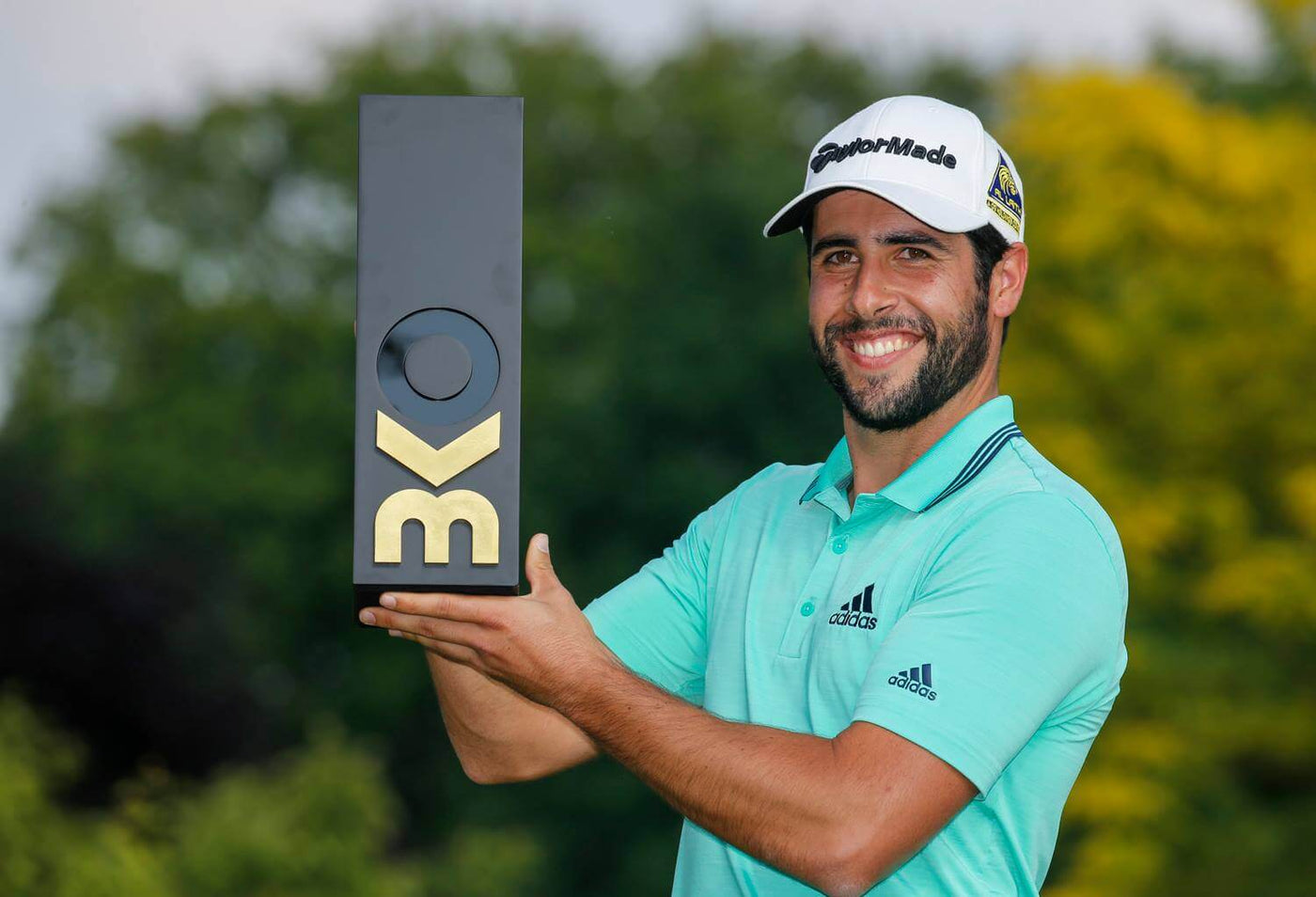 black trophy with golden letters for a golf event