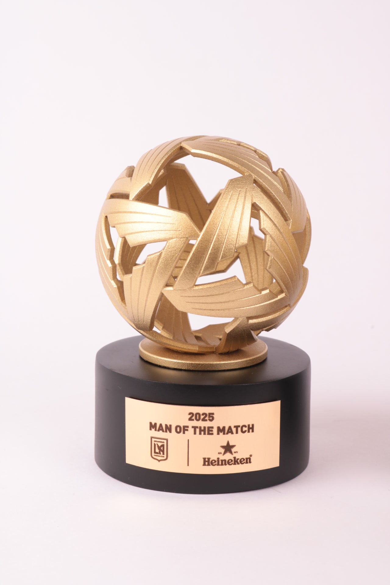 black base with golden 3d printed trophy
