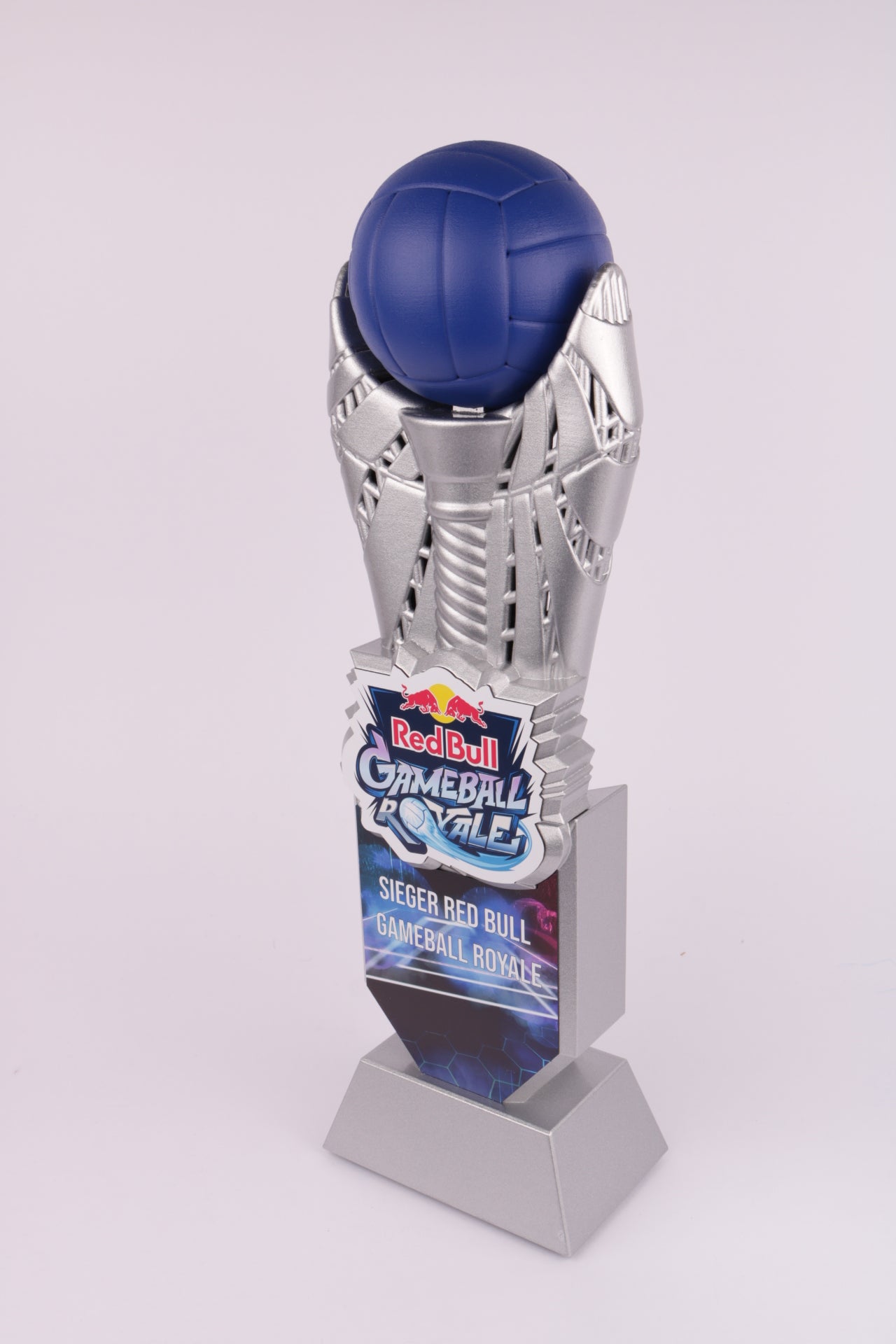 silver trophy stand with a 3d prnted trophy and a blue ball