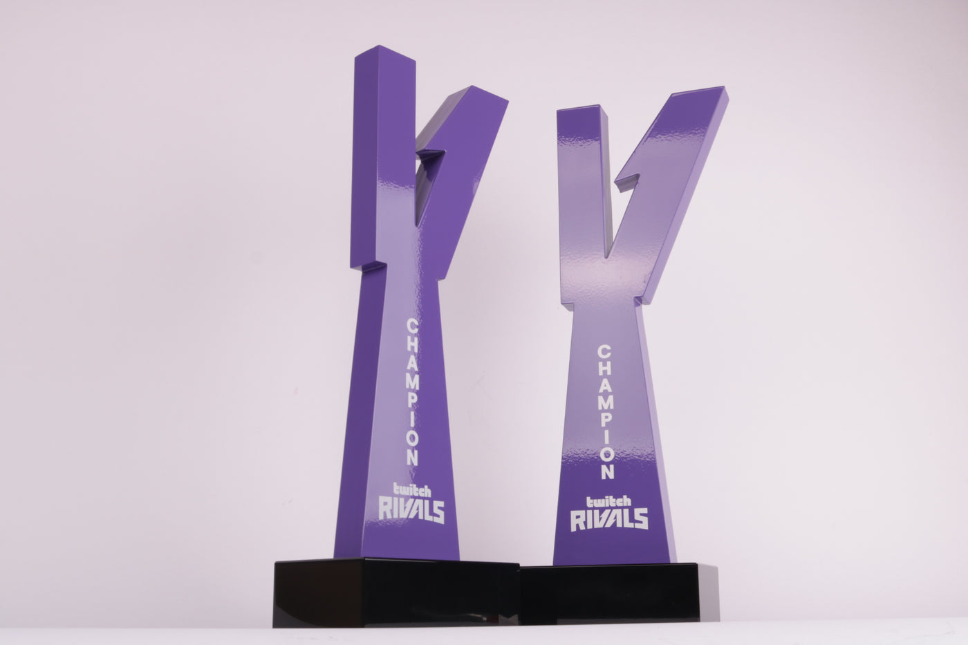 black base with a purple 3d printed y on top
