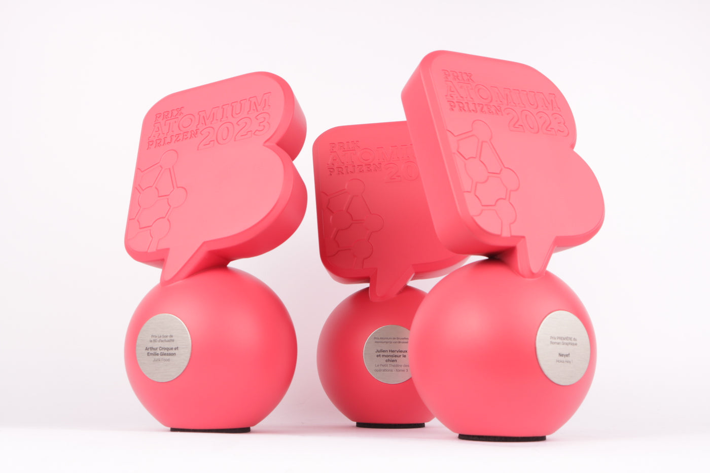 pink bals with 3d printed pink figures on top