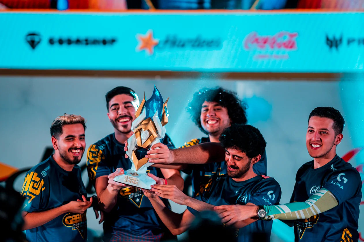 winners holding custom trophy at Intel Arabia Cup