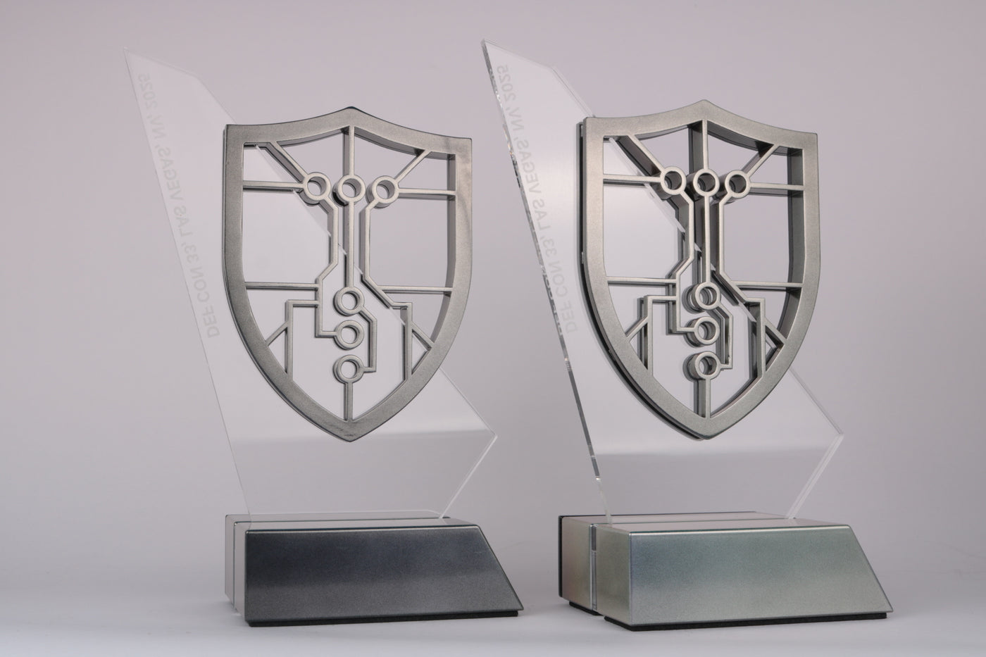 two shield trophies on acrylic plate with glossy metallic flaky paint