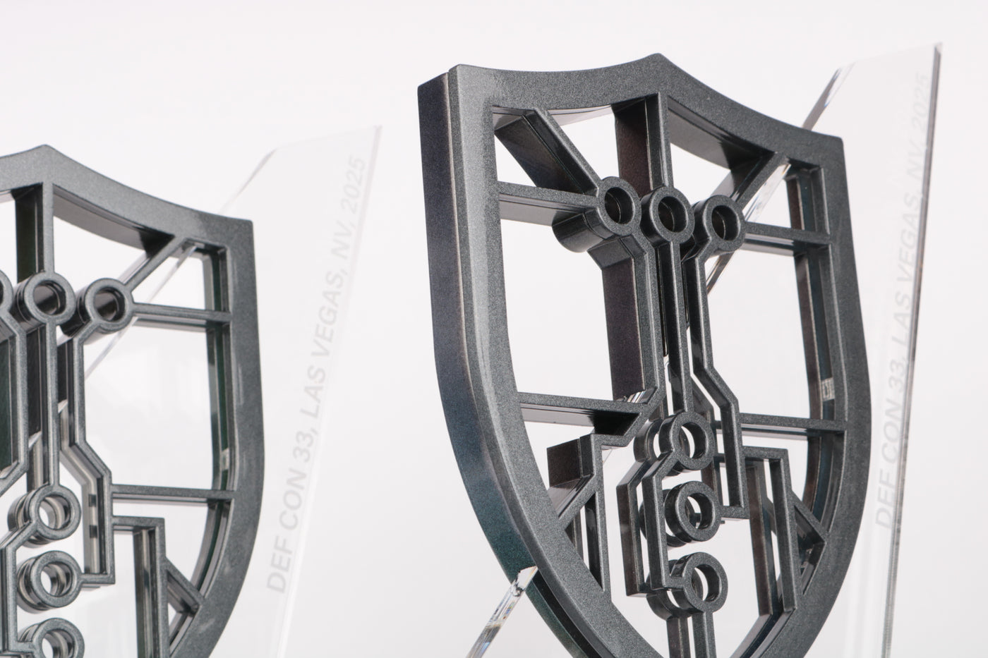 two shield trophies on acrylic plate with glossy metallic flaky paint