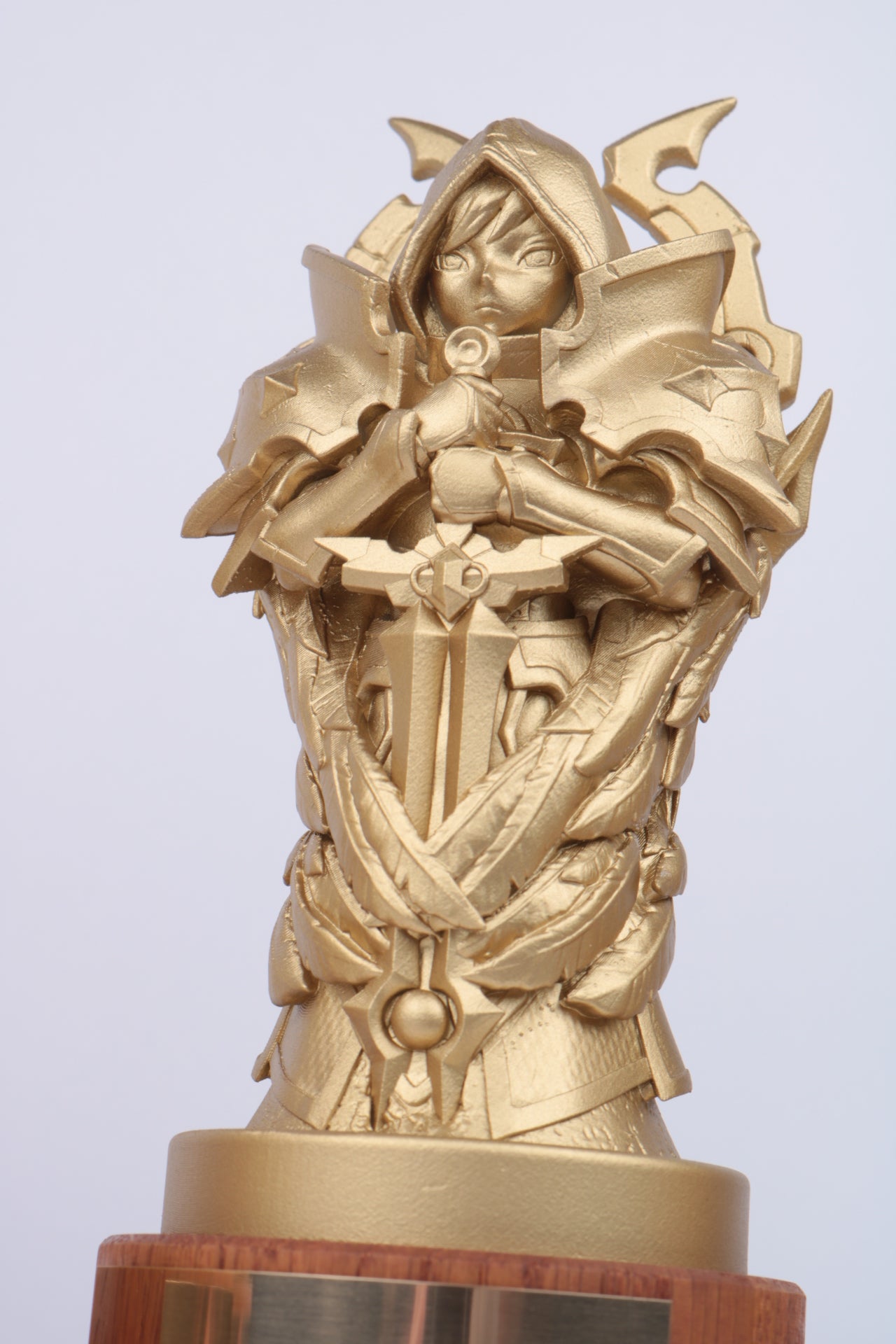 detailed character awards 3d printed figurine with heavy armor finished in gold satin paint