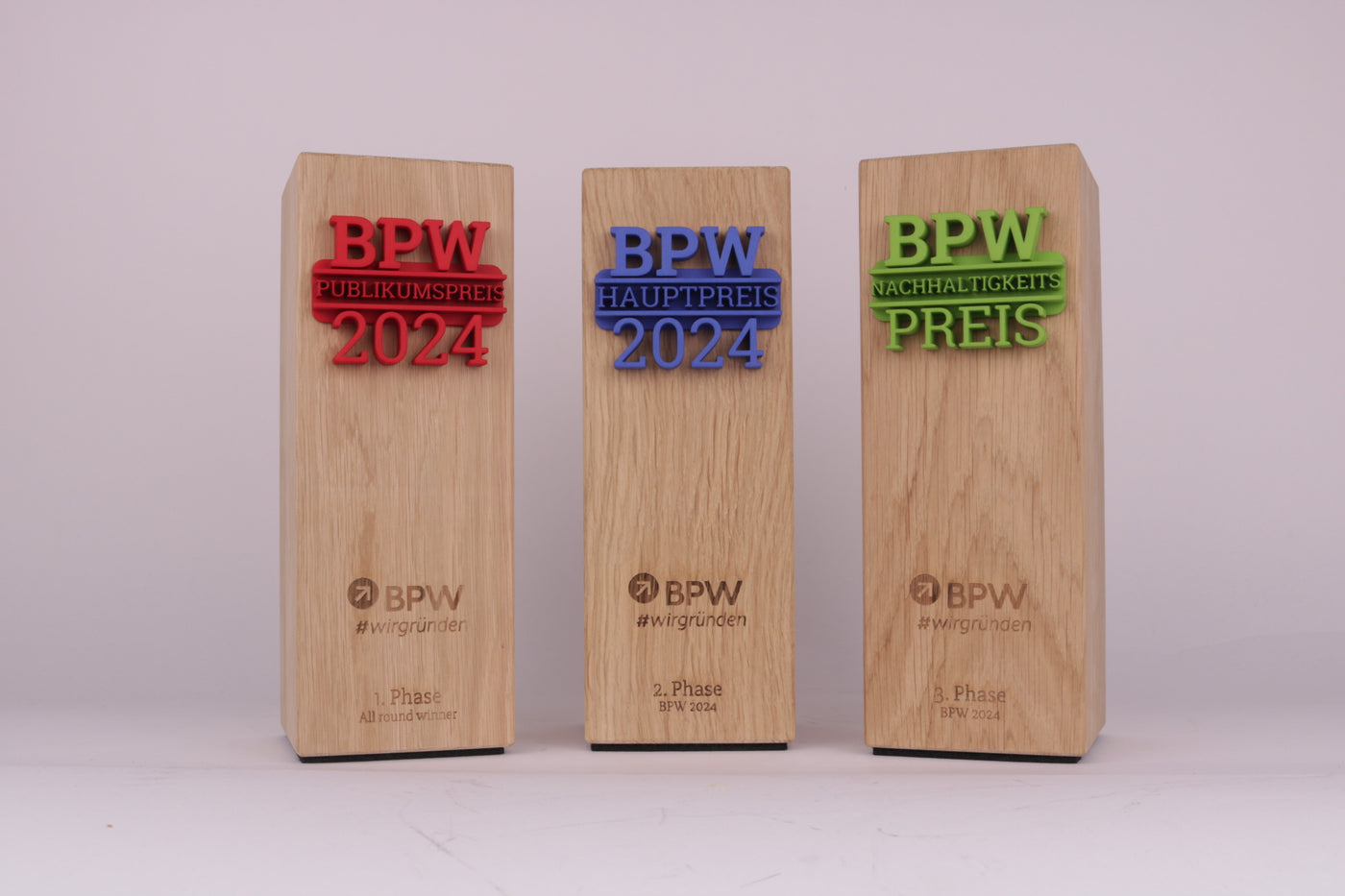 wooden trophy with a 3d printed logo for bpw