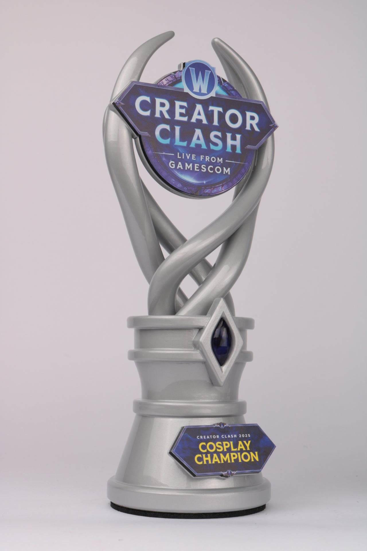 glossy metallic silver spiral award with acrylic full colour details