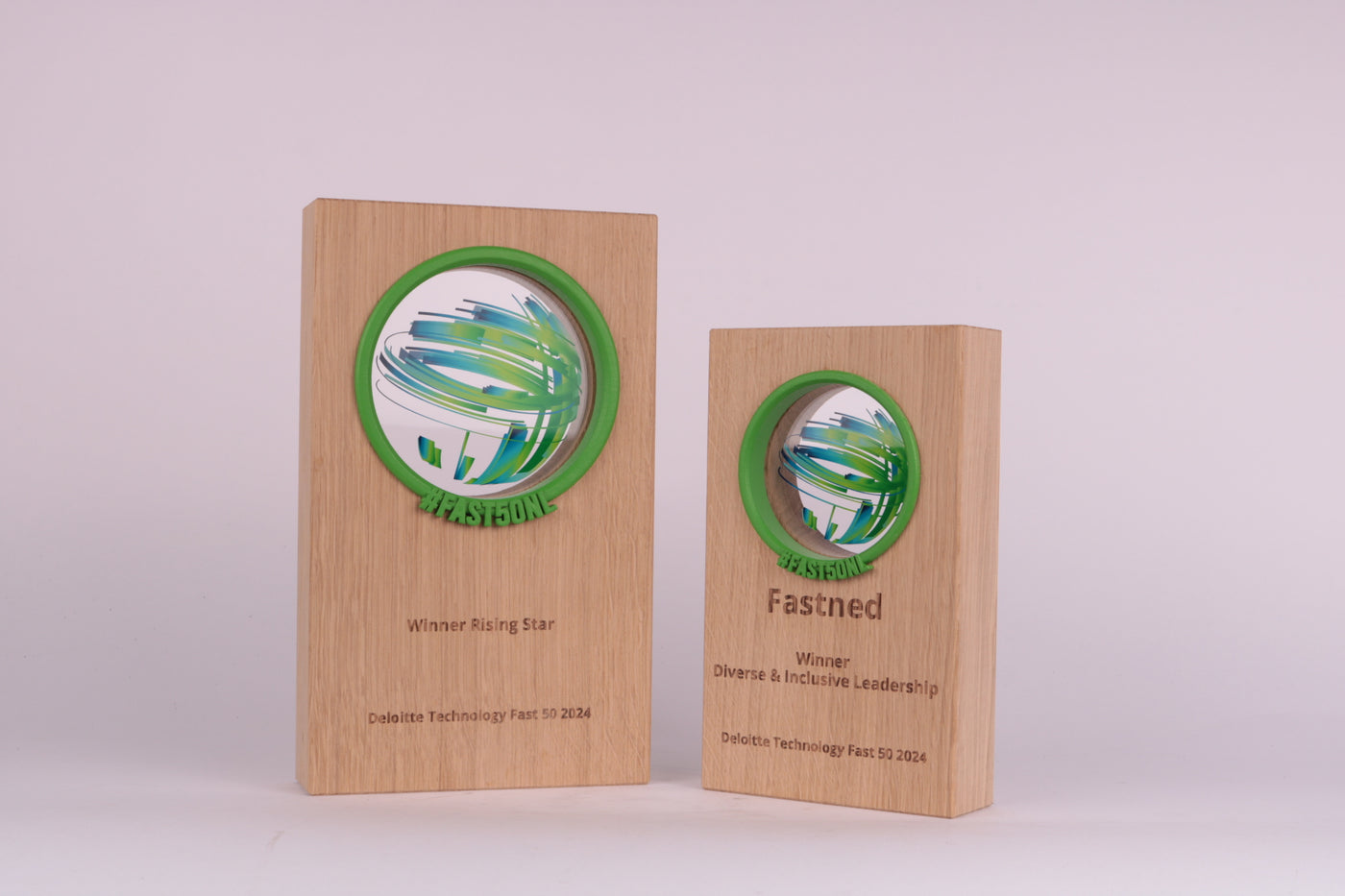 wooden trophy with a green circle in the middle