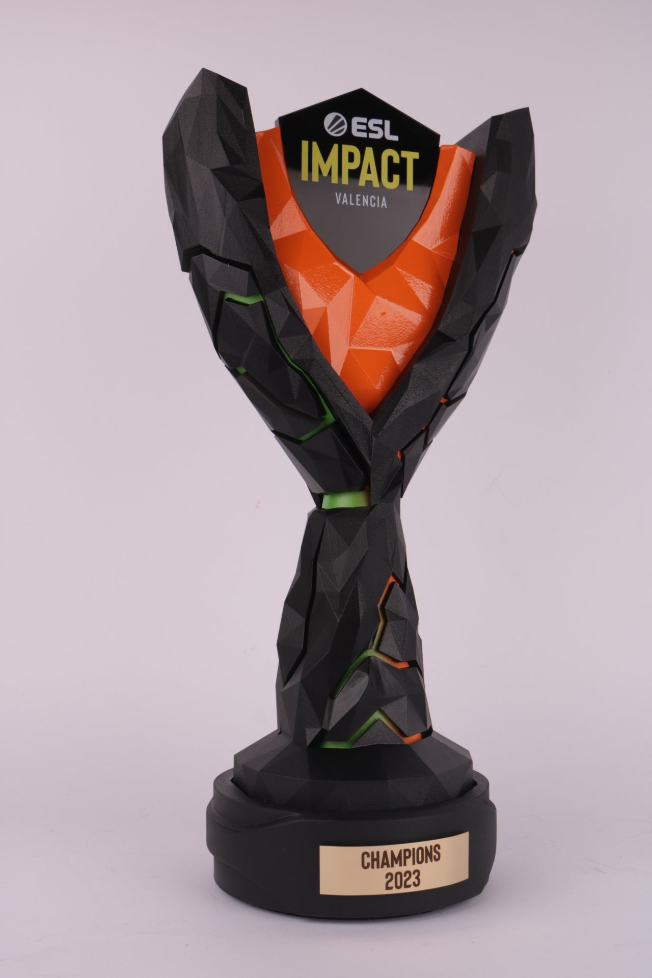 black based trophy with an 3d printed vulcano based trophy for esl impact