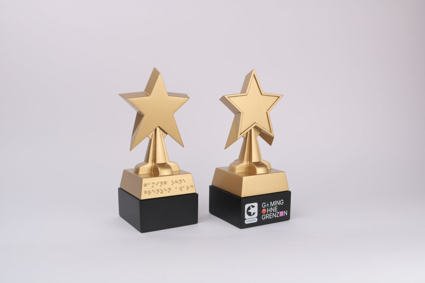 glossy golden starts 3d printed with braille text and full colour uv print on base
