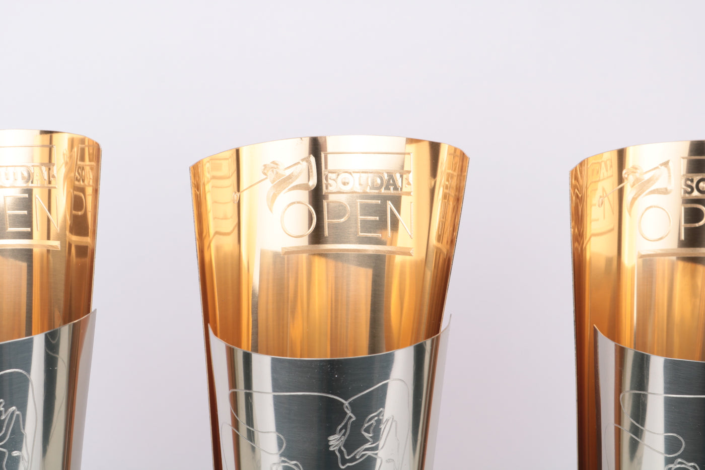shiny gold and silver metal awards with custom engraving