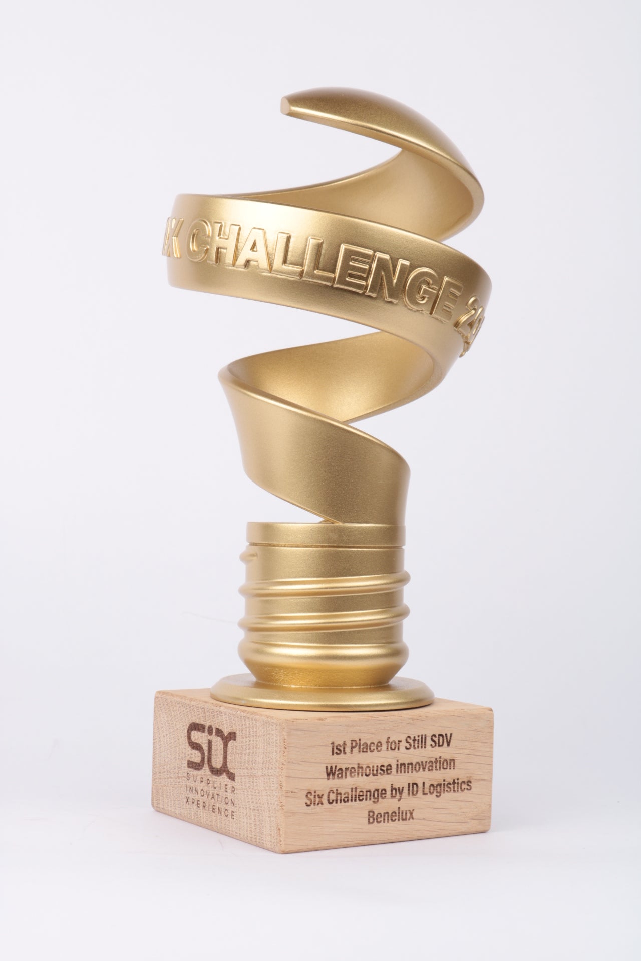 spiral cut light bulb satin gold paint on an oak base with engraved text