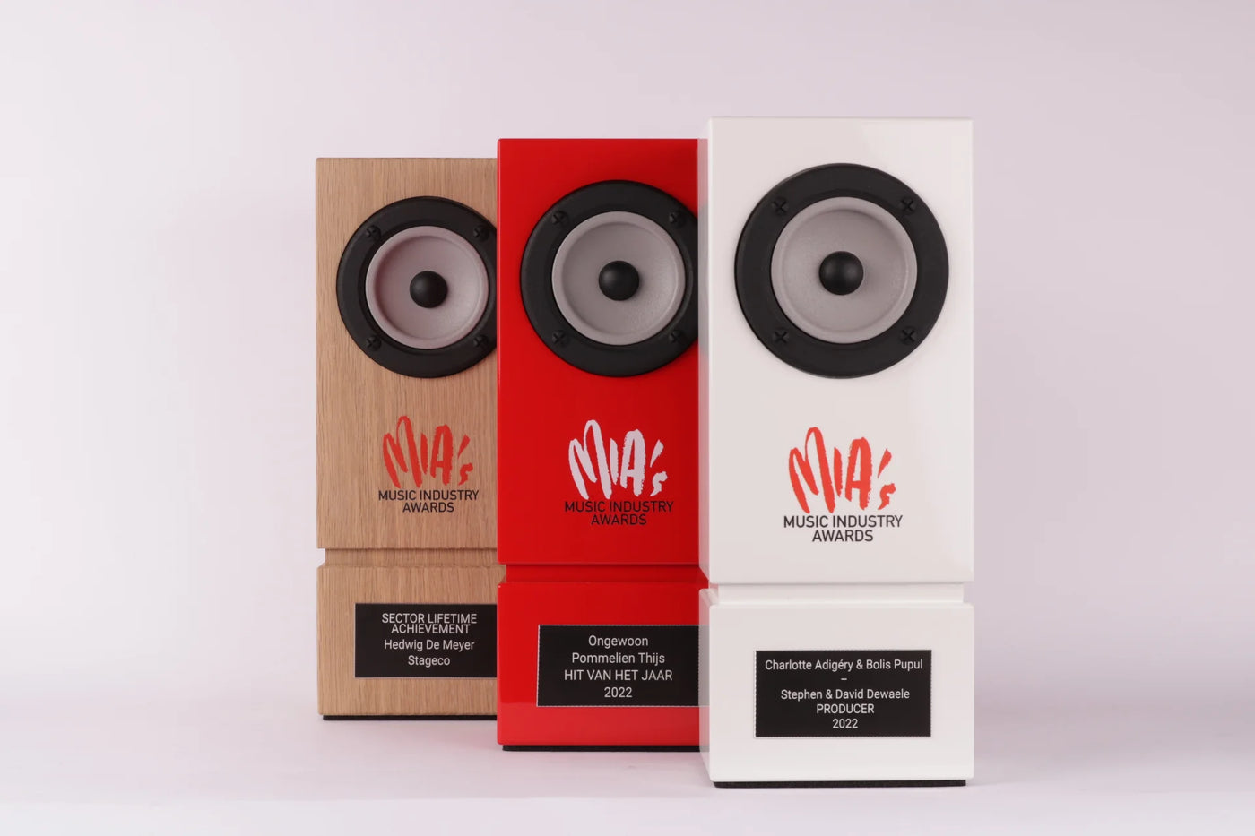 red, white and wooden speaker tropphys for the mia's