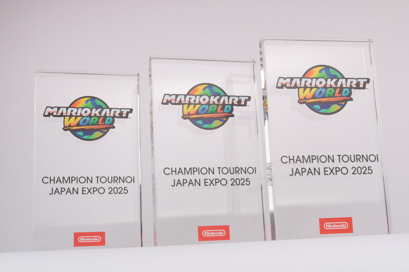 three acrylic tomstone trophies with a full colour uv print for nintendo mariokart world