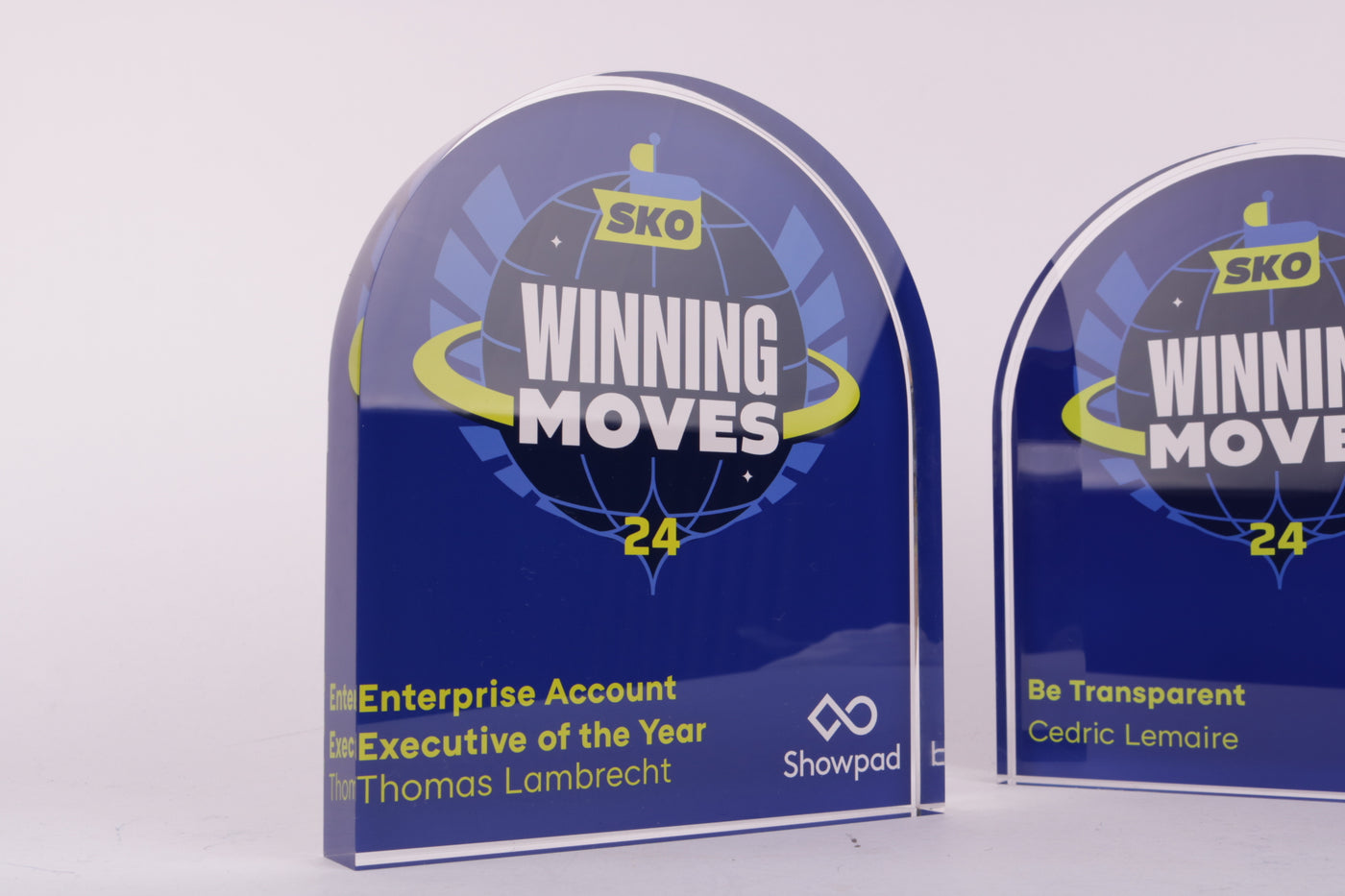 glass trophy with an acrylic blue logo design