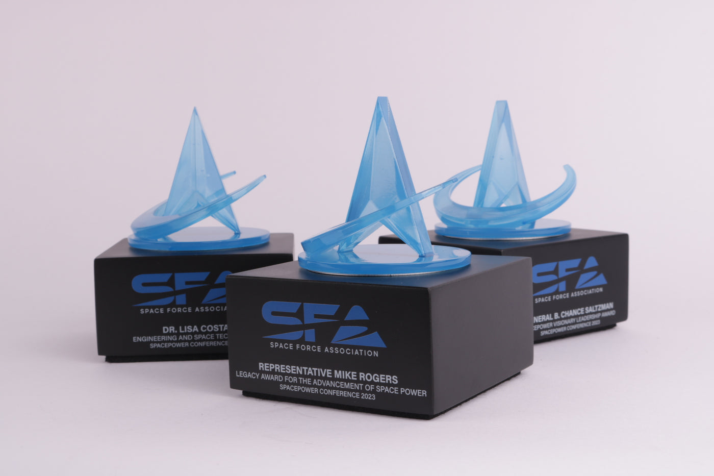 black based trophy with a blue 3d printed figure on top