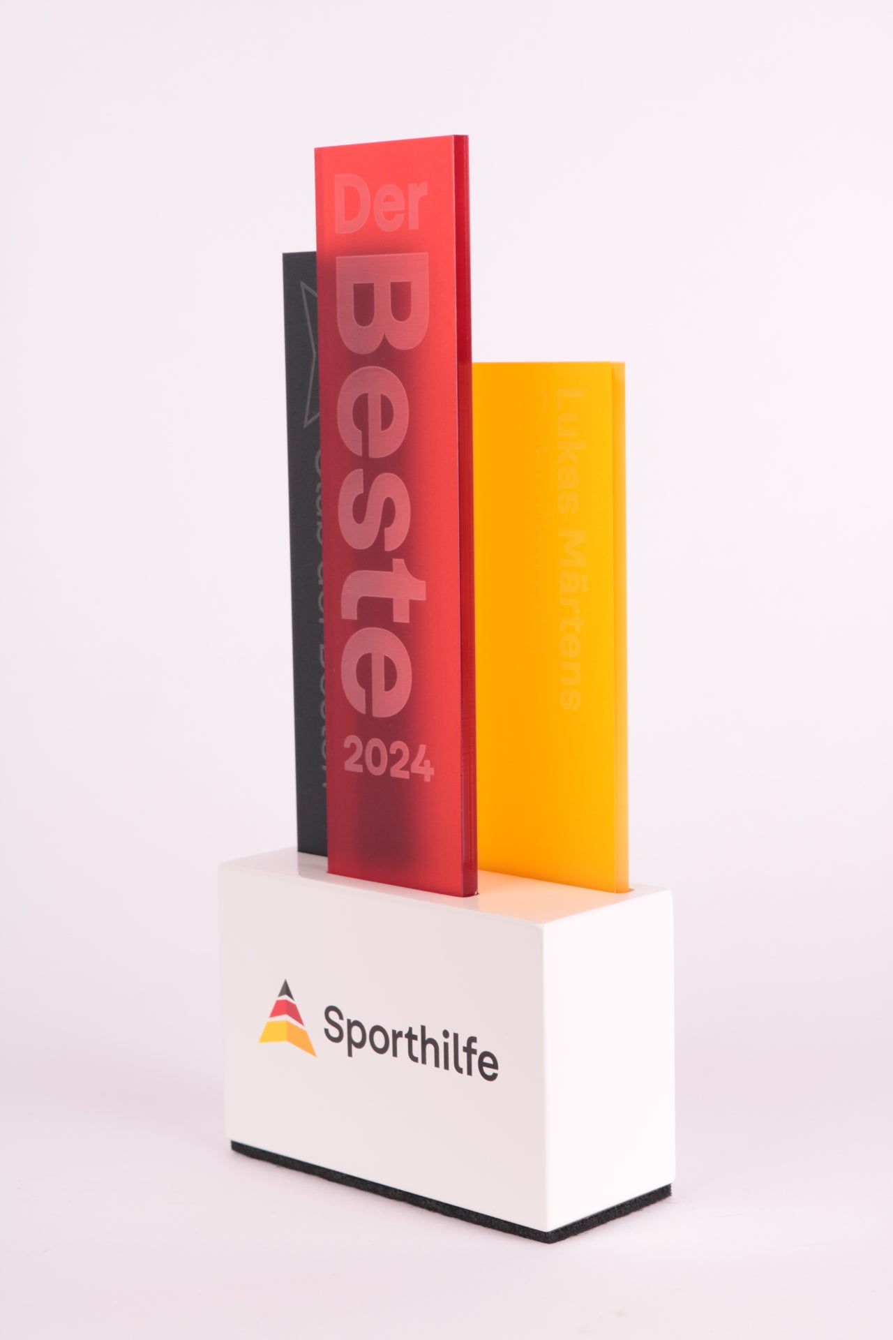 with base with an acrylic trophy on top for sporthilfe