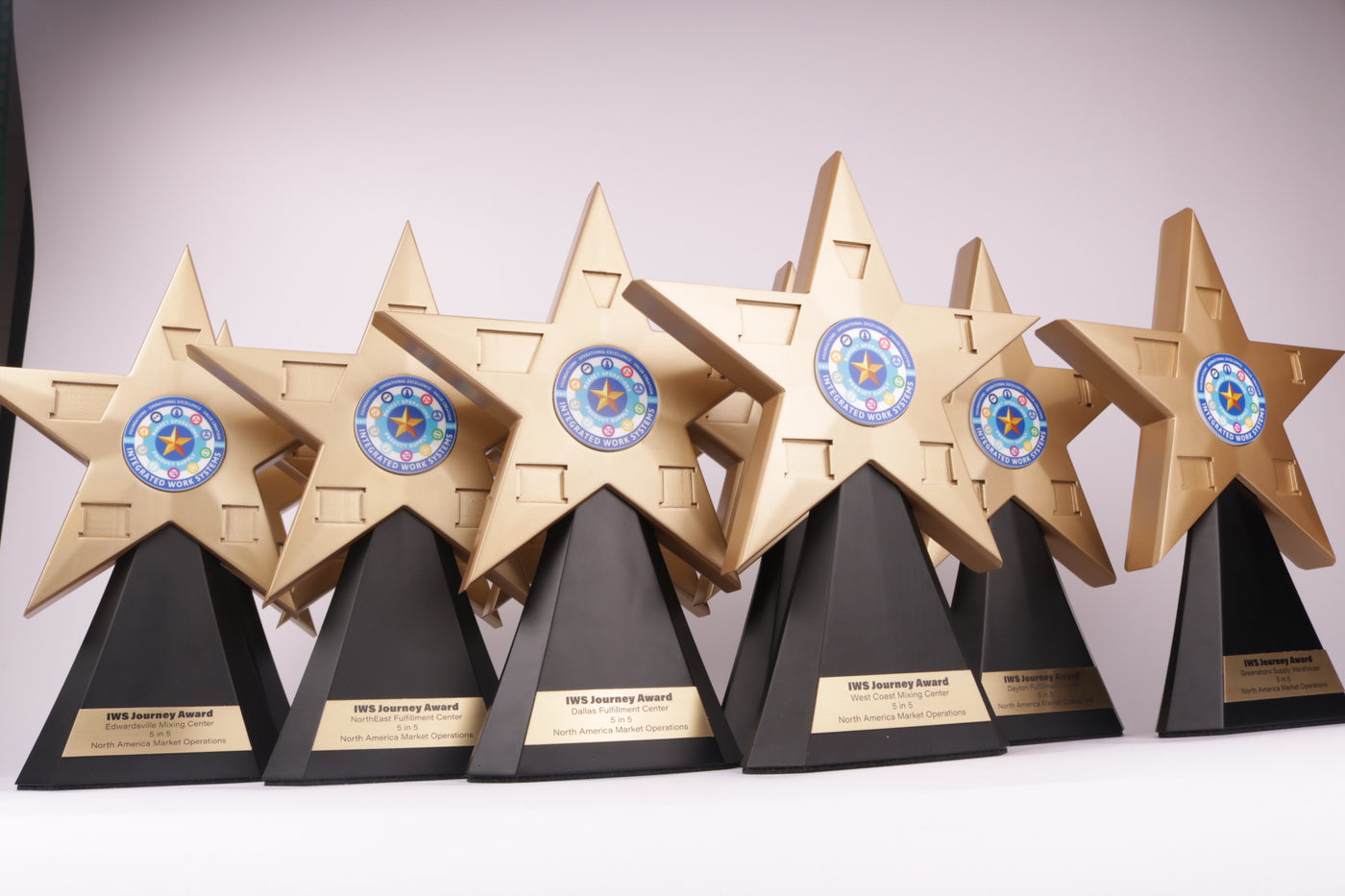black trophy base with a golden 3d printed star on top