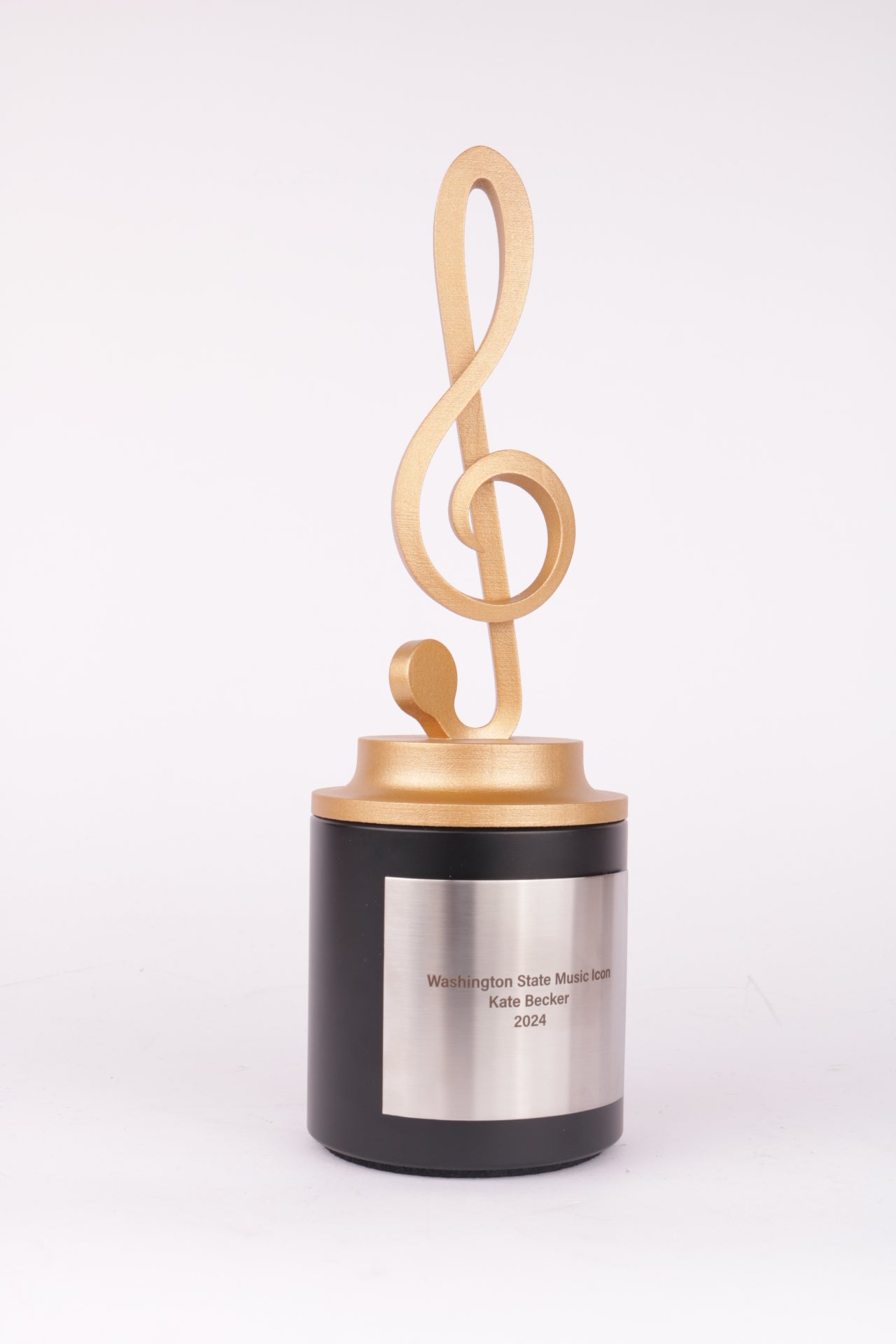 black based trophy with a gold 3d printed music note on top