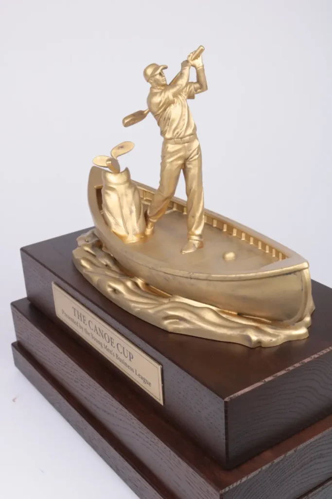Custom golf trophy with canoe design