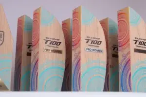 Wooden Gold Coast T100 Triathlon Pro Women trophies with colourful printed waves