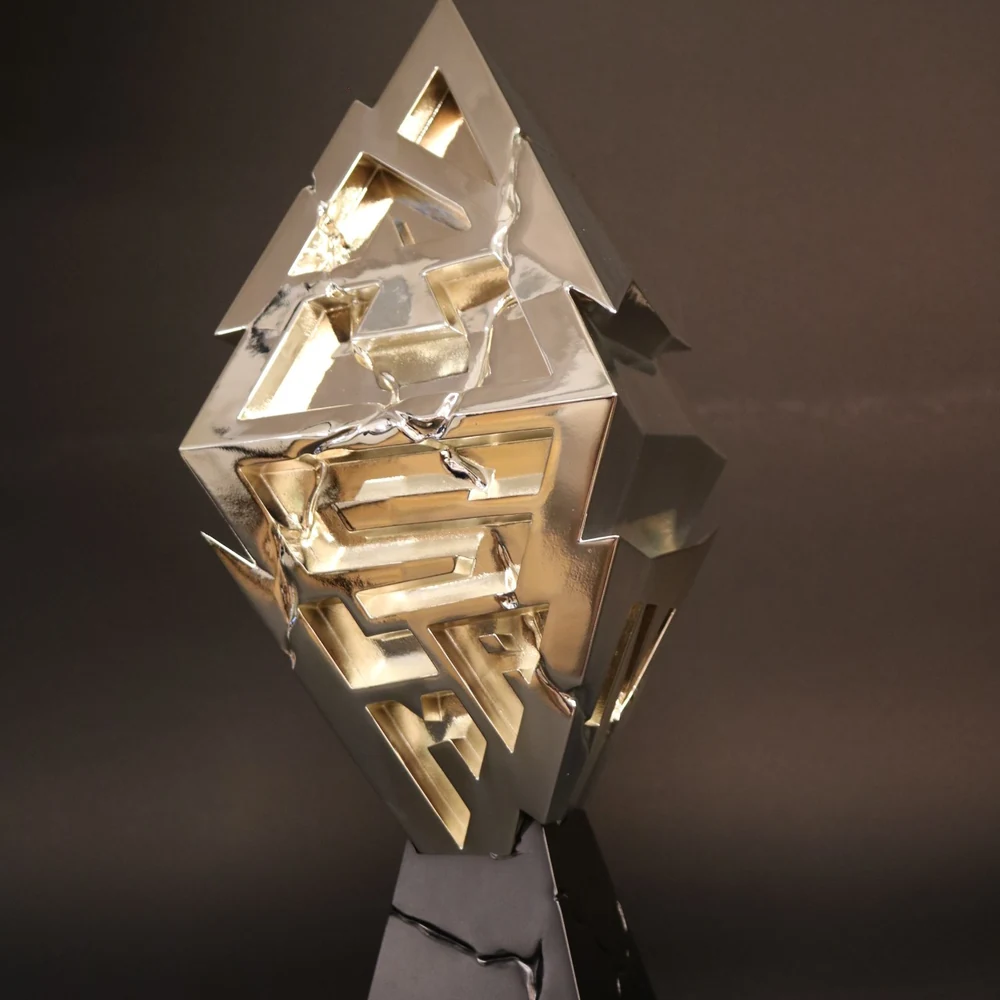 Chrome and gold plated diamond-shaped trophy