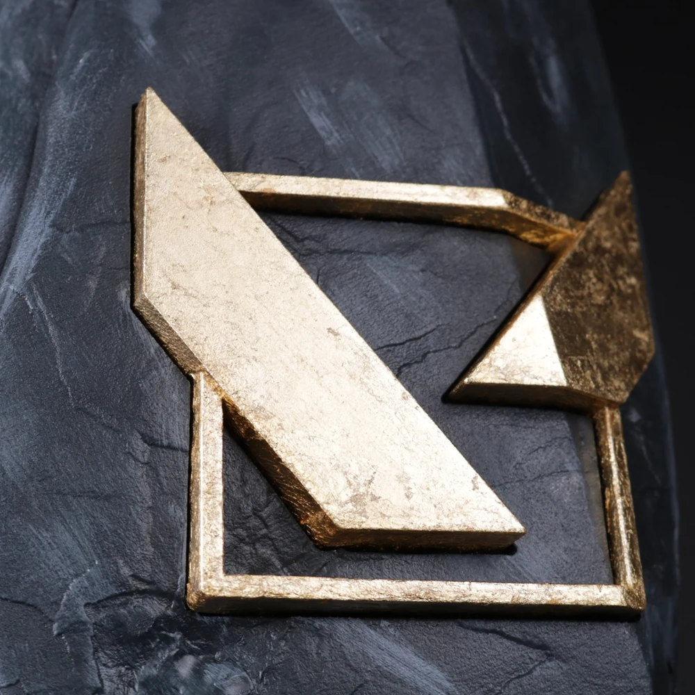 Gold leaf logo finish on a marble-look trophy