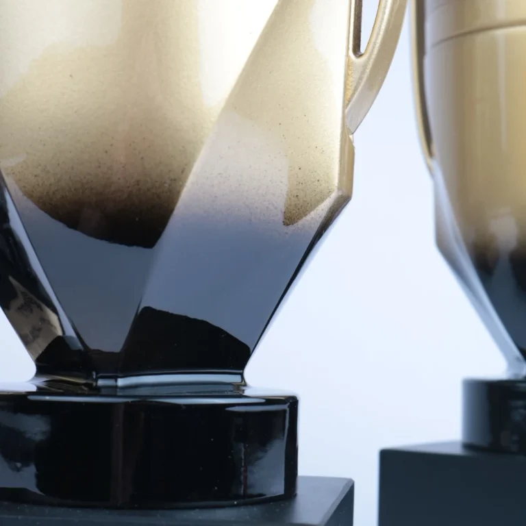 Gold to black gradient paint finish on a cup trophy