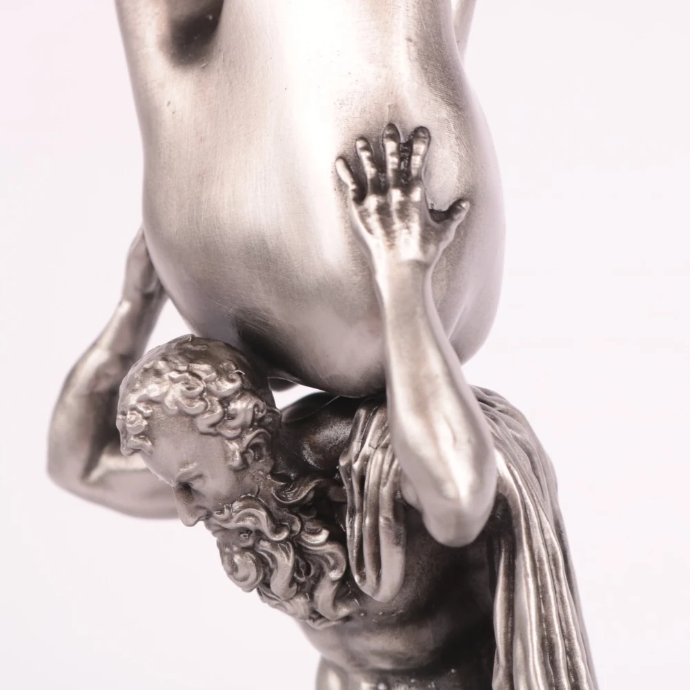 Brushed silver metal Atlas figurine trophy detail
