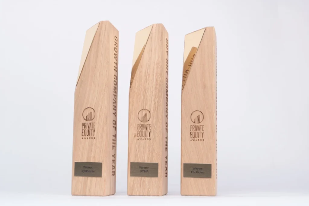 Private Equity Awards in solid oak with gold mirror tops