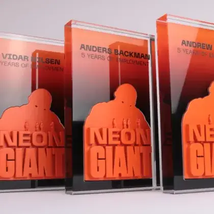 Orange acrylic employee milestone awards, made by Fabit