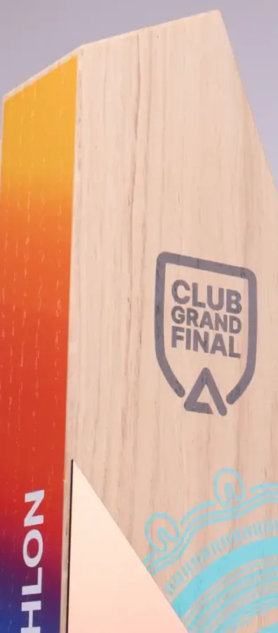 Oak trophy with a printed sunset gradient and a copper plate, made by Fabit